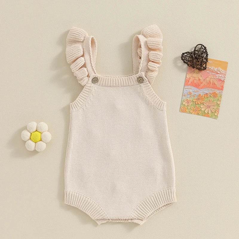 Somrig babyromper med broderade blommor