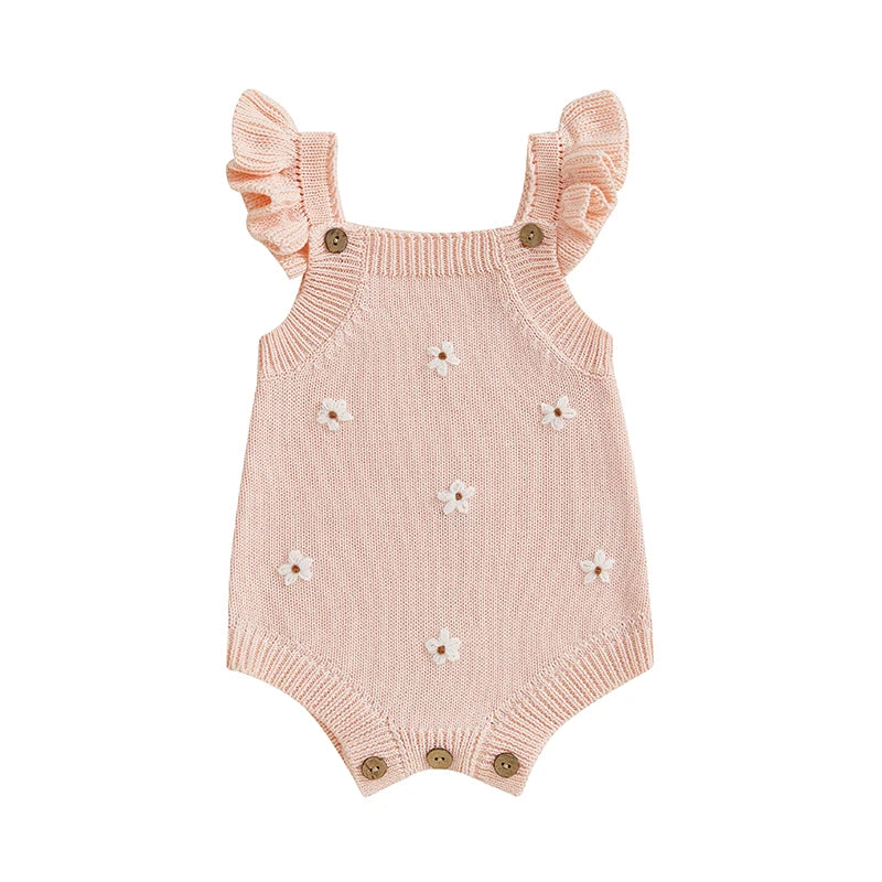 Somrig babyromper med broderade blommor