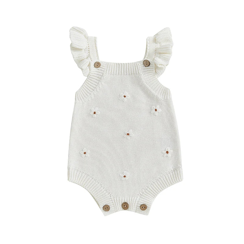 Somrig babyromper med broderade blommor