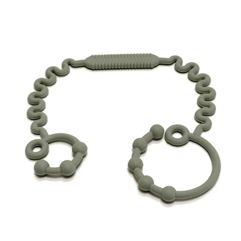 Justerbar silikonrem för nappflaska, napp eller leksak