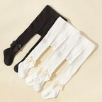 Strumpbyxor med rosett i 3-pack