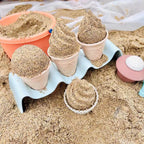 Miljövänliga strandleksaker för barn i vetestrå