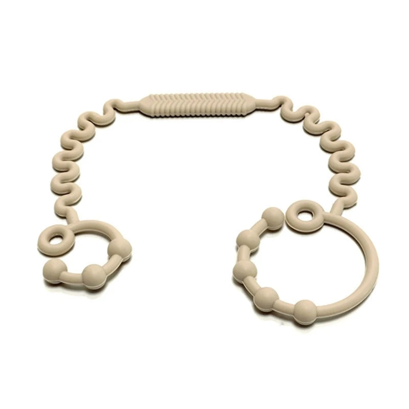 Justerbar silikonrem för nappflaska, napp eller leksak