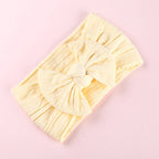 Babyhårband med rosett