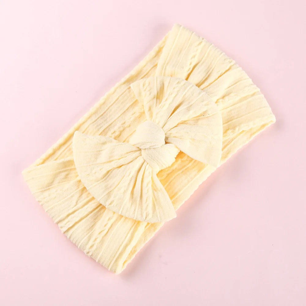 Babyhårband med rosett