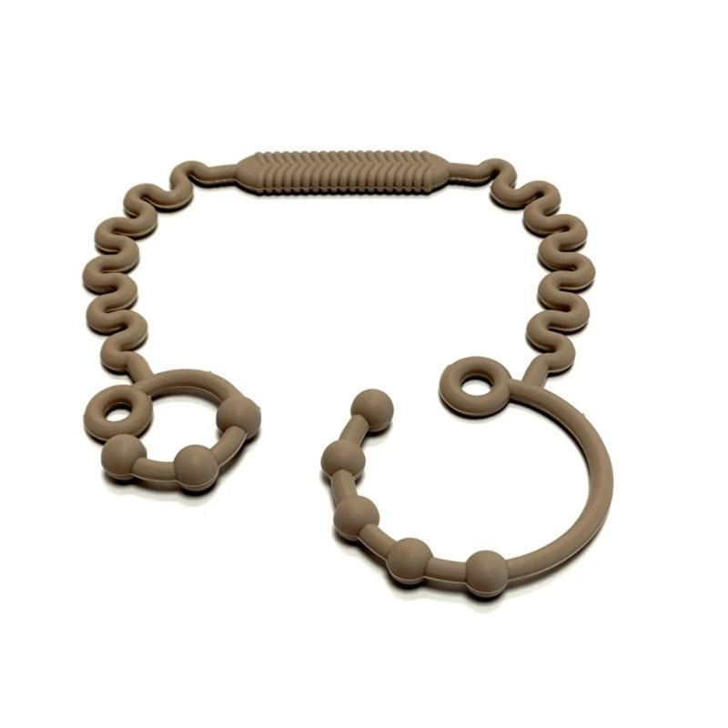 Justerbar silikonrem för nappflaska, napp eller leksak