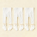 Strumpbyxor med rosett i 3-pack