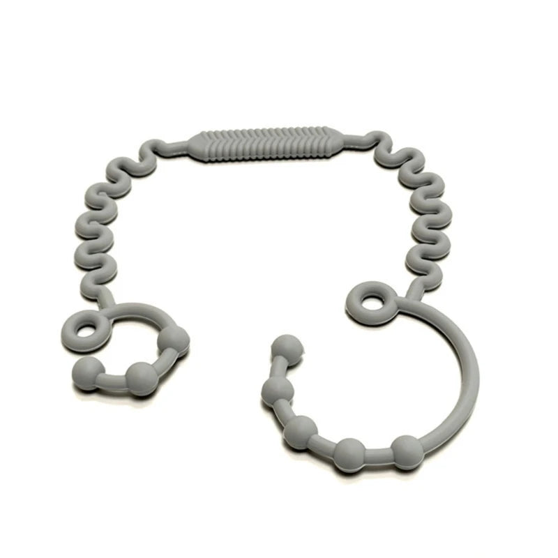 Justerbar silikonrem för nappflaska, napp eller leksak