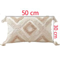 Exklusiva kuddfodral i boho stil med tofsar