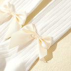 Strumpbyxor med rosett i 3-pack