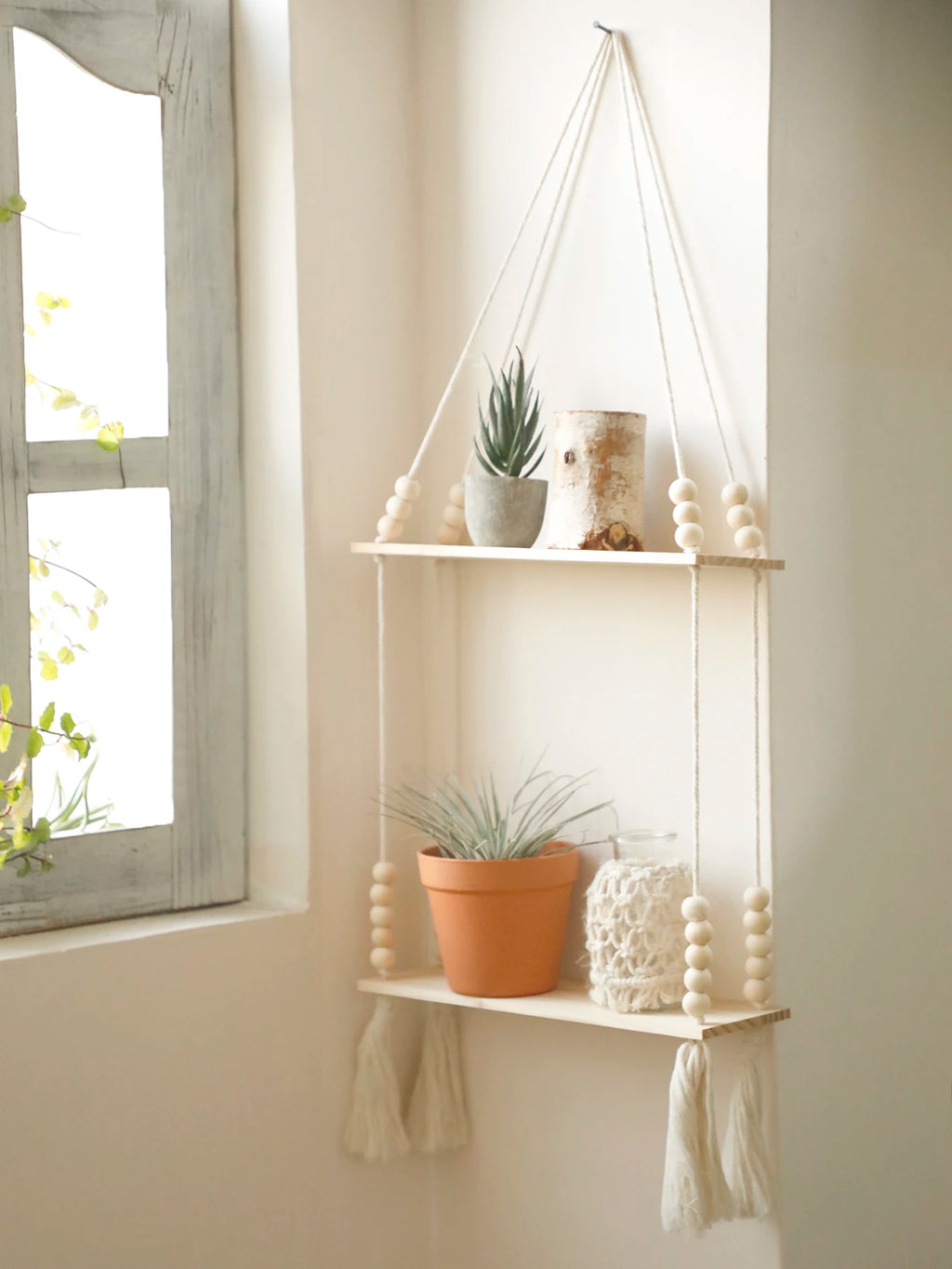 Handmade macramé wall shelf