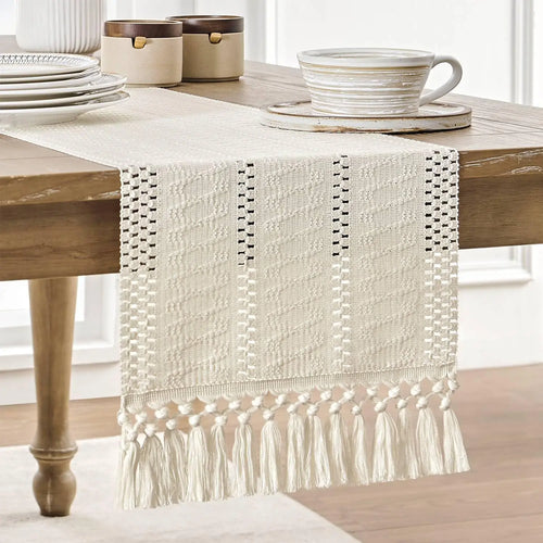 Beige bordslöpare med tofsar