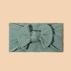 Babyhårband med rosett