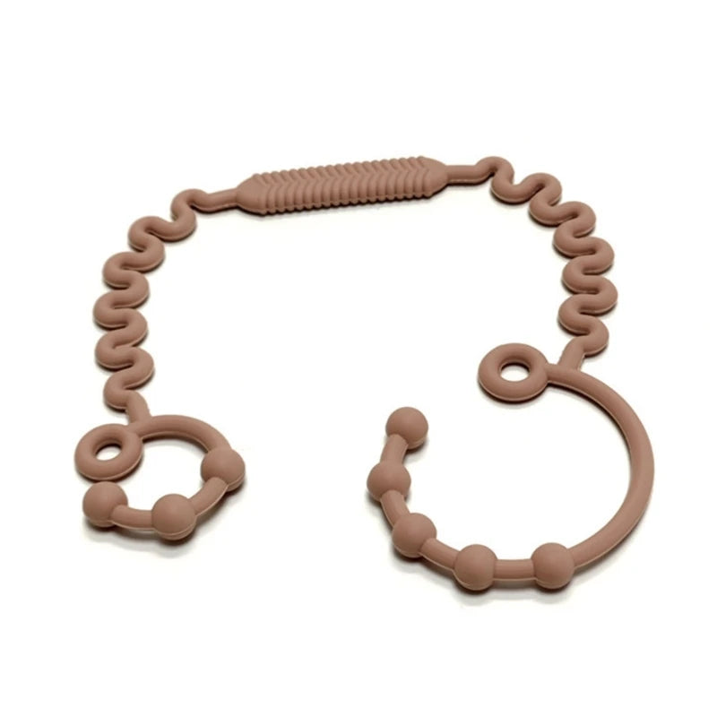 Justerbar silikonrem för nappflaska, napp eller leksak