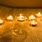 Rund ljuslykta i klarglas