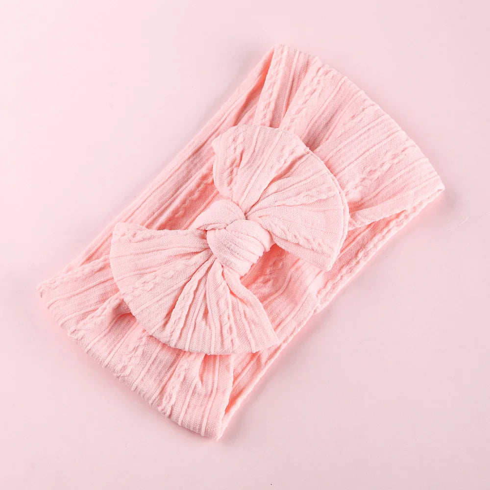 Babyhårband med rosett